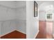 Spacious walk-in closet featuring wire shelving for optimal storage and organization solutions at 2746 Heathgate Way, Land O Lakes, FL 34638