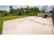 Expansive backyard features a basketball court and plenty of space for outdoor activities at 3052 Living Coral Dr, Odessa, FL 33556