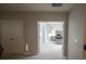 View into a serene bedroom featuring neutral decor and a cozy bed at 3052 Living Coral Dr, Odessa, FL 33556
