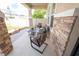 Inviting covered front porch with comfortable seating and stone accents at 3052 Living Coral Dr, Odessa, FL 33556