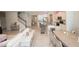 Spacious living room features tile floors, modern décor, and an open floor plan connecting the kitchen at 3052 Living Coral Dr, Odessa, FL 33556