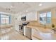Bright kitchen with stainless steel appliances, ample counter space, and a cozy adjacent dining area at 3602 Pine Knot Dr # 0, Valrico, FL 33596