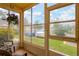 Screened-in lanai with tiled floor and view of the outdoors at 3602 Pine Knot Dr # 0, Valrico, FL 33596