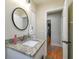 Modern bathroom features granite countertop, contemporary vanity, and updated fixtures at 3809 N 14Th St, Tampa, FL 33603