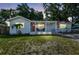 Charming single-story home with well-maintained lawn and inviting front porch at 3809 N 14Th St, Tampa, FL 33603