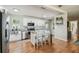 Bright kitchen featuring white cabinets, stainless steel appliances, and a functional island at 3809 N 14Th St, Tampa, FL 33603