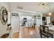 Open-concept kitchen features modern appliances, a center island, and hardwood floors at 3809 N 14Th St, Tampa, FL 33603