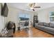 Home office with computer setup, comfortable couch, window view, and ample space at 3809 N 14Th St, Tampa, FL 33603