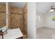 Bathroom showcasing a tiled shower and a modern sink vanity at 3901 17Th N Ave, St Petersburg, FL 33713