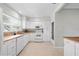 Bright kitchen featuring white cabinetry, stainless appliances, and ample counter space at 3901 17Th N Ave, St Petersburg, FL 33713
