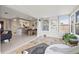 Spacious living area with tiled floors, an open layout, and natural light at 3901 17Th N Ave, St Petersburg, FL 33713