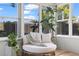 Relaxing sunroom with comfortable seating, natural light, and views of the outdoors at 3901 17Th N Ave, St Petersburg, FL 33713
