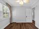 Cozy bedroom space featuring hardwood flooring and natural light, with an empty floor at 4111 W Granada St, Tampa, FL 33629
