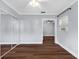Charming bedroom featuring wood floors, a ceiling fan and access to an additional room at 4111 W Granada St, Tampa, FL 33629