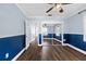 Bedroom with mirrored closet doors and hardwood floors at 4111 W Granada St, Tampa, FL 33629