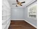 Small room with bookcase, hardwood floors, and natural light at 4111 W Granada St, Tampa, FL 33629