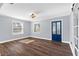 Bright entryway featuring new wood flooring, a stained-glass door, and fresh paint at 4111 W Granada St, Tampa, FL 33629