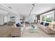 An open-concept space with tile floors, a dining area, and contemporary furniture at 4111 W Granada St, Tampa, FL 33629