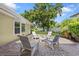 Inviting brick patio with comfortable seating, perfect for outdoor relaxation and entertaining at 4111 W Granada St, Tampa, FL 33629