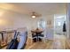 Bright and inviting dining area with an adjacent in-unit laundry with a view to the entry at 4207 Touchton Pl # 4207, New Port Richey, FL 34652