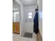 Bright entryway featuring a white door with a window and neutral tile floors at 4207 Touchton Pl # 4207, New Port Richey, FL 34652