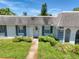 Charming home featuring a well-maintained lawn, a stone pathway, and blue shutters at 4207 Touchton Pl # 4207, New Port Richey, FL 34652