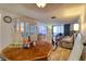 Open concept living room showcasing a dining area, cabinet lighting and a comfortable seating arrangement at 4207 Touchton Pl # 4207, New Port Richey, FL 34652
