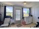 Relaxing sunroom with a view of the water, and comfortable seating at 4207 Touchton Pl # 4207, New Port Richey, FL 34652
