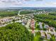 Aerial view highlighting the community's layout, waterways, and lush greenery at 422 Cypress View Dr, Oldsmar, FL 34677