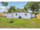 Well-kept backyard featuring lush green grass and a fenced perimeter at 4434 Perch St, Tampa, FL 33617