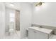 Bathroom featuring updated vanity, fixtures, and walk-in shower at 4434 Perch St, Tampa, FL 33617
