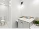 Modern bathroom featuring sleek vanity, updated fixtures, and tiled walk-in shower at 4434 Perch St, Tampa, FL 33617