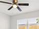 Bedroom with modern ceiling fan and natural lighting at 4434 Perch St, Tampa, FL 33617
