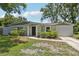 Charming single-story home features a well-maintained front yard and inviting front entrance at 4434 Perch St, Tampa, FL 33617