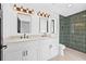 Modern bathroom features double vanity, sleek fixtures, and stylish tiled shower at 4495 Clearwater Harbor S Dr, Largo, FL 33770
