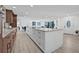 Expansive kitchen featuring a large island, modern appliances, and plenty of cabinet space for storage at 4495 Clearwater Harbor S Dr, Largo, FL 33770