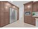 Kitchen area with rich wood cabinetry, stainless steel appliances, and a clean, modern design at 4495 Clearwater Harbor S Dr, Largo, FL 33770