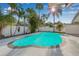 Relax poolside amidst lush tropical foliage and enjoy the privacy of a fenced backyard at 4495 Clearwater Harbor S Dr, Largo, FL 33770