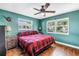 Cozy bedroom with ample natural light and hardwood flooring at 5001 37Th N Ave, St Petersburg, FL 33710