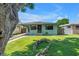 Charming single-story home with well-maintained lawn and inviting curb appeal at 5001 37Th N Ave, St Petersburg, FL 33710