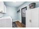 Laundry room with new appliances, storage cabinets, and convenient access at 5001 37Th N Ave, St Petersburg, FL 33710