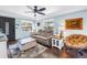 Comfortable living room with modern furnishings, lots of light, and hardwood floors at 5001 37Th N Ave, St Petersburg, FL 33710