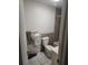 Bathroom featuring a toilet, shower and tiled floor at 516 7Th W Ave # 1, Palmetto, FL 34221