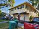 Charming two-story home with a covered front porch and well-maintained landscaping at 516 7Th W Ave # 1, Palmetto, FL 34221