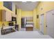 Bright kitchen features stainless appliances, white countertops, and ample storage space at 5423 Windbrush Dr, Tampa, FL 33625