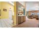 Open kitchen offering a wet bar, a breakfast bar, plenty of natural light and access to the living room at 5423 Windbrush Dr, Tampa, FL 33625