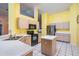 Bright kitchen featuring modern stainless steel appliances, ample cabinet space, and an island at 5423 Windbrush Dr, Tampa, FL 33625