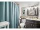 Cozy bathroom with a shower and a vanity with a granite countertop at 5567 Sea Forest Dr # 323, New Port Richey, FL 34652