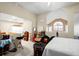 Spacious bedroom featuring unique architectural details and natural light, filled with furniture and other items at 5567 Sea Forest Dr # 323, New Port Richey, FL 34652