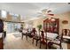 Open-concept living and dining area with high ceilings and ample natural light at 5567 Sea Forest Dr # 323, New Port Richey, FL 34652